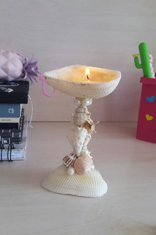 Seashell candle holder made with glued shells and a tea light for beach inspired summer decor
