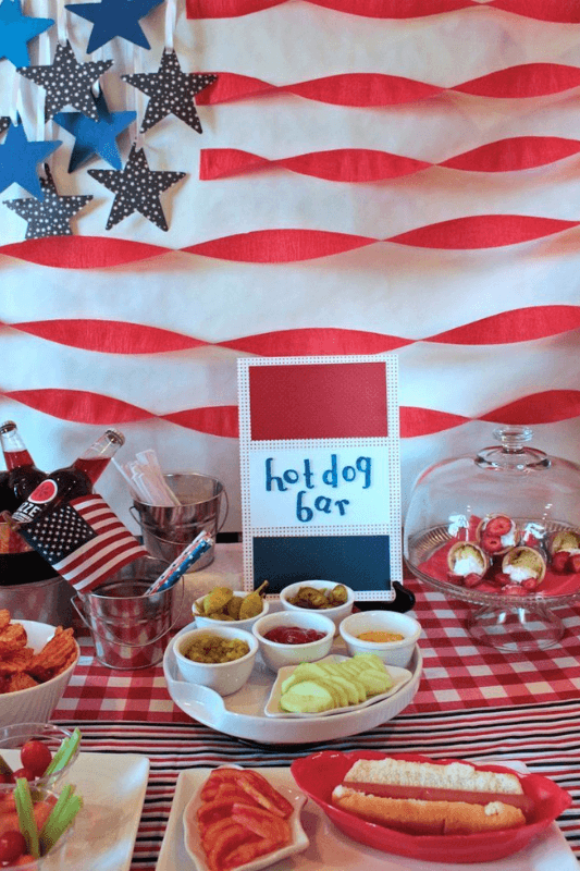 4th of July hot dog bar with toppings for a party
