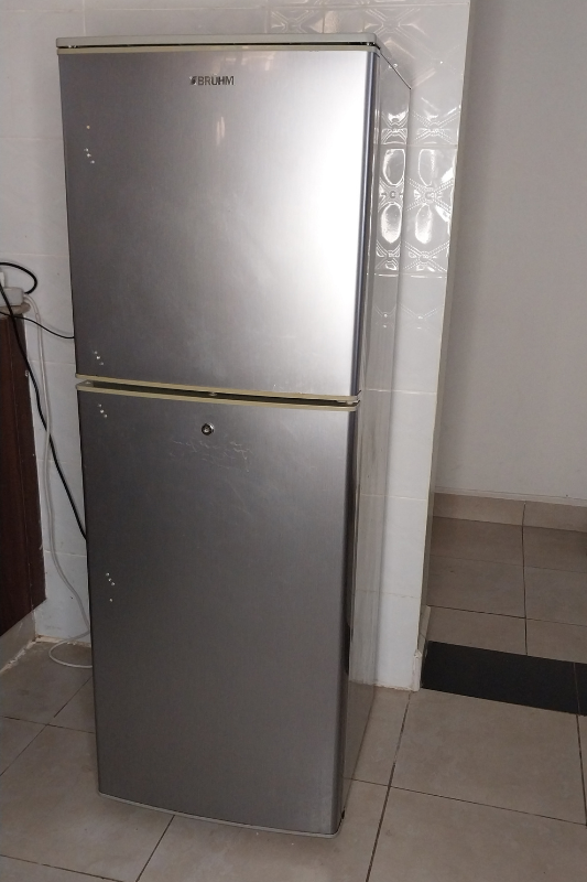 Clean stainless steel refrigerator ready for simple fridge decor